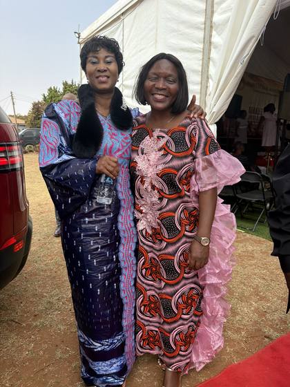 Two women of the church smiling together