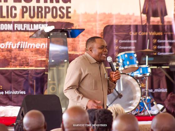 A minister preaching to the conference