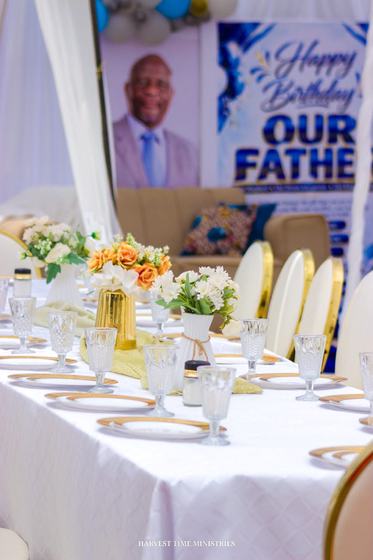 The decorated banquet table beneath the birthday banner