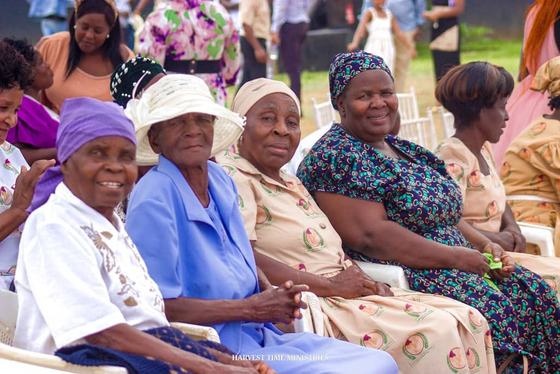 Mothers of the church seated together at the celebration