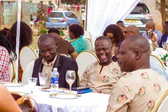 Ministers sharing a laugh at the guest table
