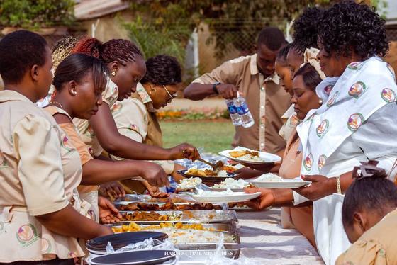 Members being served at the buffet